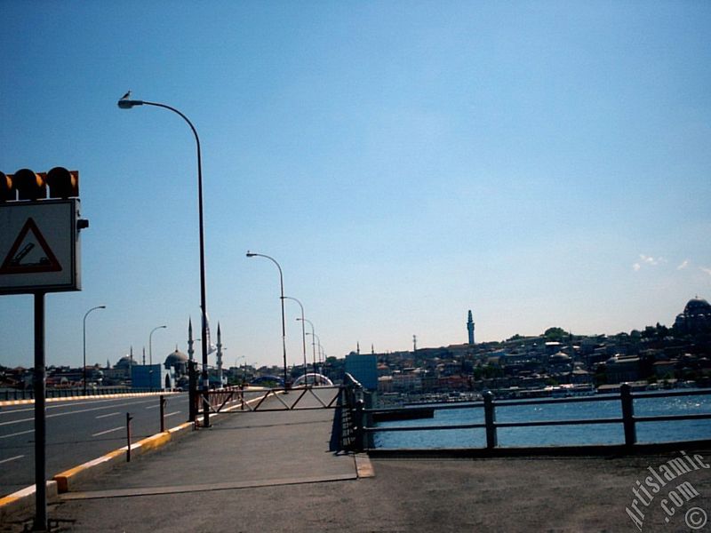 View towards the shore, (from right) Suleymaniye Mosque, Beyazit Tower, (at far behind) Beyazit Mosque, Yeni Cami (Mosque) and Sultan Ahmet Mosque (Blue Mosque) from Galata Bridge located in Istanbul city of Turkey.
